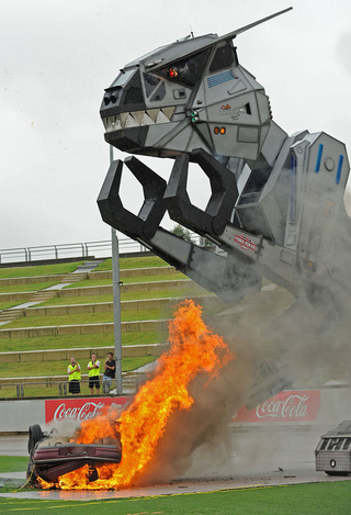 Illustration for article titled Robosaurus Devours A Creme-Filled Car: Time-Lapse Gallery